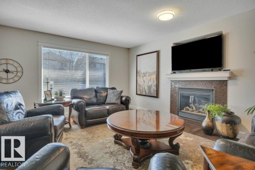 13 Selkirk Place, Leduc, AB - Indoor Photo Showing Living Room With Fireplace