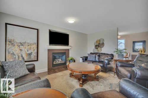 13 Selkirk Place, Leduc, AB - Indoor Photo Showing Living Room With Fireplace