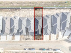 Aerial image with property boundary. Highlighting the property within a residential development - 
