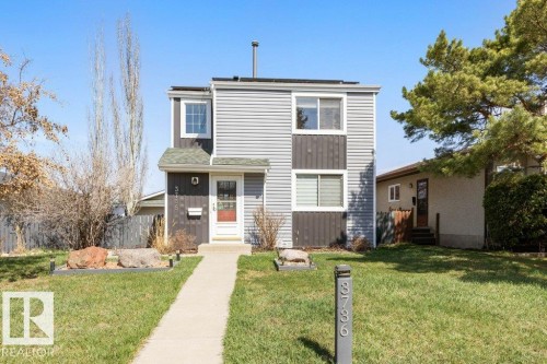 Two-story residence featuring horizontal siding and vertical paneling - 3736 12 Avenue, Edmonton, AB - Outdoor