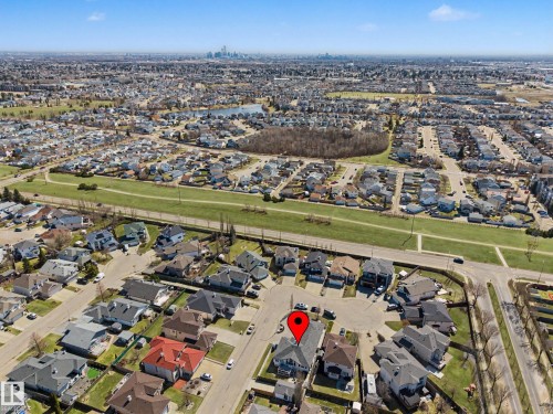 Aerial perspective showcasing a residential area with varied housing styles - 324 Cutts Crest, Edmonton, AB - Outdoor With View