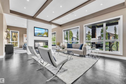 4727 Woolsey Common, Edmonton, AB - Indoor Photo Showing Living Room With Fireplace
