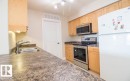 418 13111 140 Avenue, Edmonton, AB  - Indoor Photo Showing Kitchen With Double Sink 