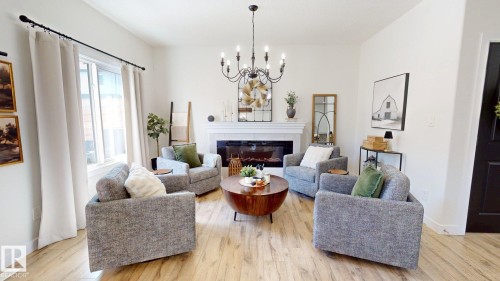 7217 Chivers Place, Edmonton, AB - Indoor Photo Showing Living Room With Fireplace
