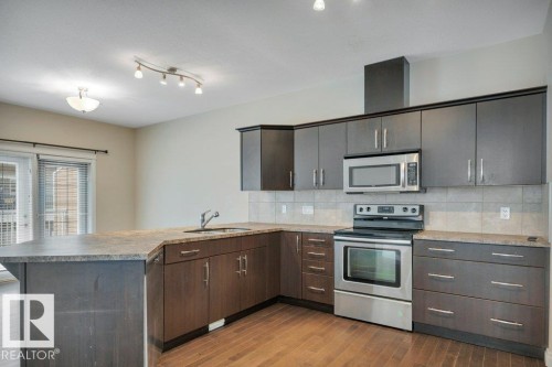 8 Kingdom Place, Leduc, AB - Indoor Photo Showing Kitchen With Upgraded Kitchen