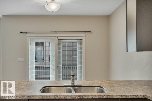 8 Kingdom Place, Leduc, AB - Indoor Photo Showing Kitchen With Double Sink