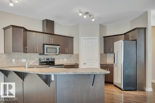 8 Kingdom Place, Leduc, AB - Indoor Photo Showing Kitchen With Upgraded Kitchen