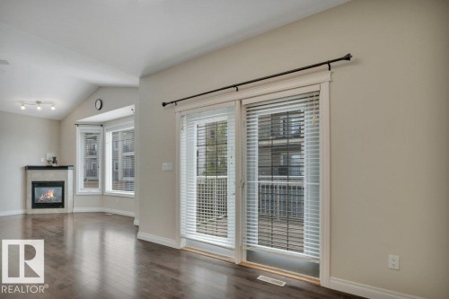 8 Kingdom Place, Leduc, AB - Indoor Photo Showing Other Room With Fireplace
