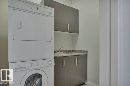 8 Kingdom Place, Leduc, AB - Indoor Photo Showing Laundry Room
