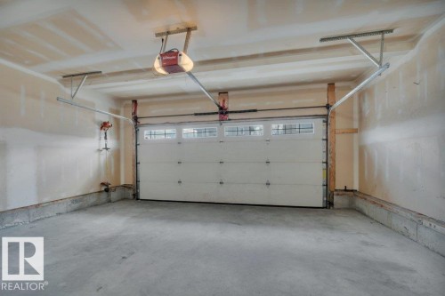 8 Kingdom Place, Leduc, AB - Indoor Photo Showing Garage