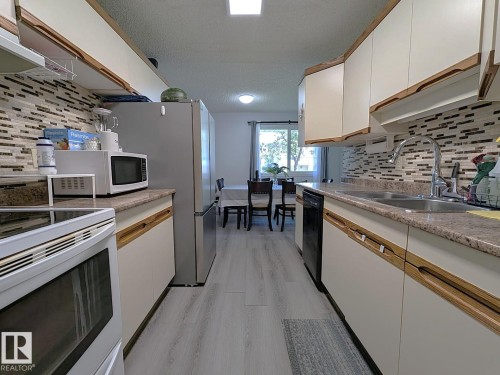 61 Mcleod Place, Edmonton, AB - Indoor Photo Showing Kitchen With Double Sink