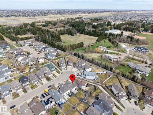 Residential neighborhood setting with mature trees and green spaces - 7723 7A Avenue, Edmonton, AB - Outdoor With View