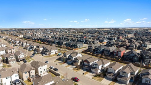 Sprawling residential area featuring a collection of detached homes, paved streets, and uniform lot sizes - 6115 18 Avenue, Edmonton, AB - Outdoor With View