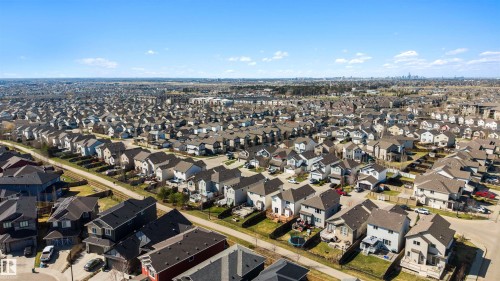 Expansive residential development featuring detached homes with varied exterior finishes and private backyards - 6115 18 Avenue, Edmonton, AB - Outdoor With View