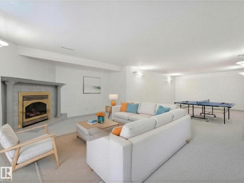 6303 92B Avenue, Edmonton, AB - Indoor Photo Showing Living Room With Fireplace