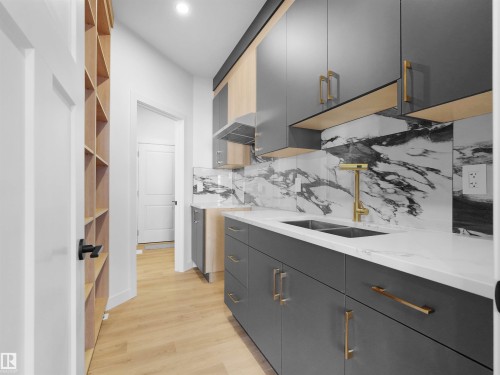 3520 45 Avenue, Beaumont, AB - Indoor Photo Showing Kitchen With Double Sink