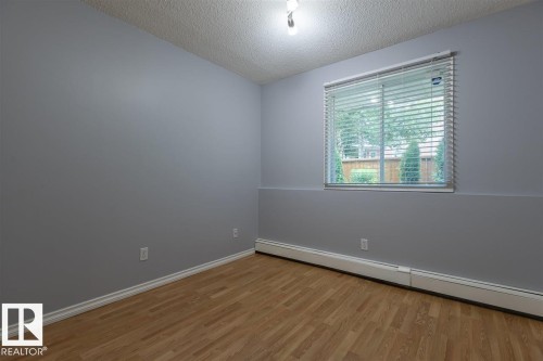 108 9010 106 Avenue, Edmonton, AB - Indoor Photo Showing Other Room