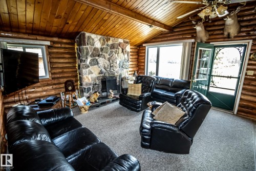 18 Horseshoe Bay Drive, Rural St. Paul County, AB - Indoor With Fireplace