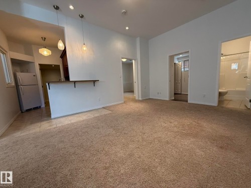 PHOTO OF THE BASEMENT FAMILY ROOM AREA! WITH 9Ft CEILINGS! - 2335 Rutherford Way, Edmonton, AB - Indoor Photo Showing Other Room