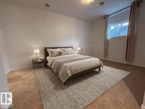 PHOTO OF THE OVERSIZED BASEMENT BEDROOM WITH 9Ft CEILINGS! - 2335 Rutherford Way, Edmonton, AB - Indoor Photo Showing Other Room