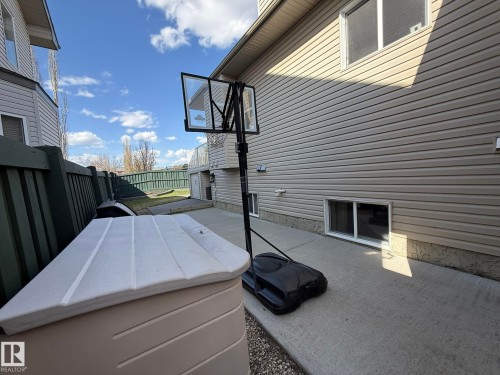 NOTE THE EXTRA VINYL SHED FOR YOUR TIRES ETC & A MEDAL ROLL TOP FOR MORE STORAGE! - 2335 Rutherford Way, Edmonton, AB - Outdoor With Exterior
