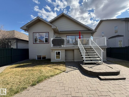 Great Photo of the back of the house with the massive DOUBLE SHED UNDER THE DECK! A TRULY MUST SEE... - 2335 Rutherford Way, Edmonton, AB - Outdoor With Deck Patio Veranda