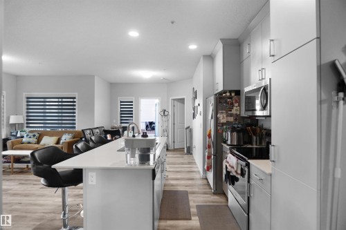 156 1818 Rutherford Road, Edmonton, AB - Indoor Photo Showing Kitchen With Upgraded Kitchen