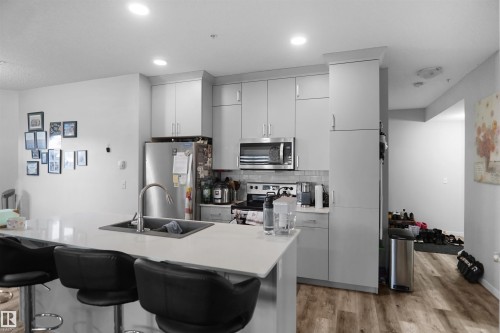 156 1818 Rutherford Road, Edmonton, AB - Indoor Photo Showing Kitchen With Double Sink