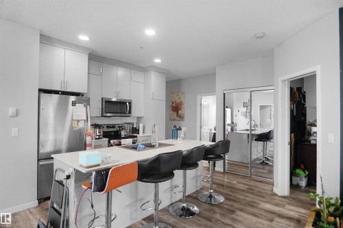 156 1818 Rutherford Road, Edmonton, AB - Indoor Photo Showing Kitchen With Stainless Steel Kitchen With Double Sink
