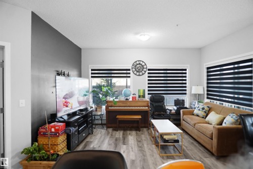 156 1818 Rutherford Road, Edmonton, AB - Indoor Photo Showing Living Room