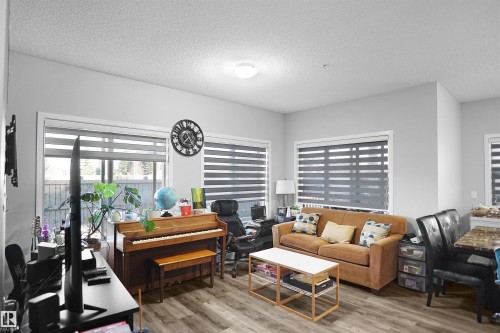 156 1818 Rutherford Road, Edmonton, AB - Indoor Photo Showing Living Room
