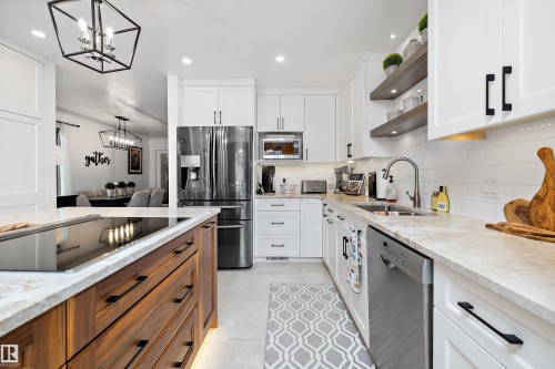 7739 80 Avenue, Edmonton, AB - Indoor Photo Showing Kitchen With Double Sink With Upgraded Kitchen