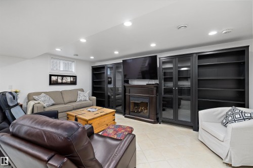 7739 80 Avenue, Edmonton, AB - Indoor With Fireplace