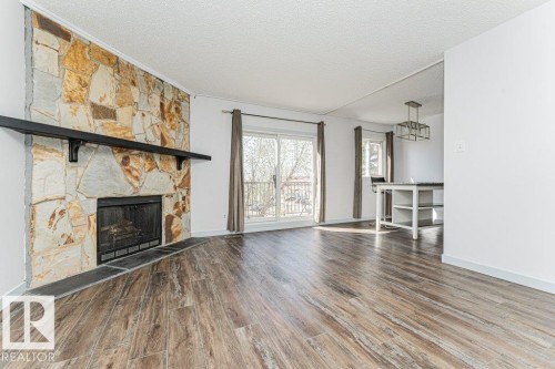 308 14004 26 Street, Edmonton, AB - Indoor Photo Showing Living Room With Fireplace