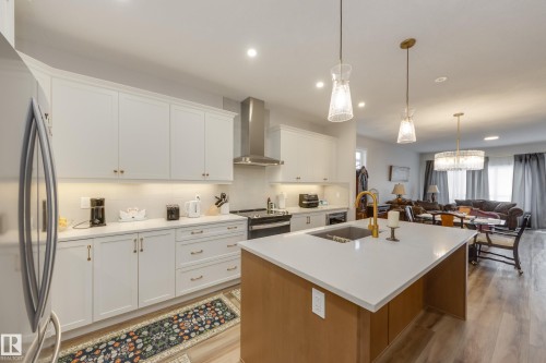 169 Stonehouse Way, Leduc, AB - Indoor Photo Showing Kitchen With Upgraded Kitchen