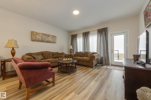 169 Stonehouse Way, Leduc, AB - Indoor Photo Showing Living Room