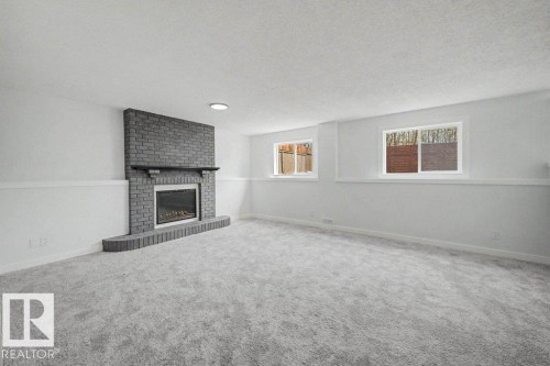 67A Arbor Crescent, St. Albert, AB - Indoor Photo Showing Living Room With Fireplace