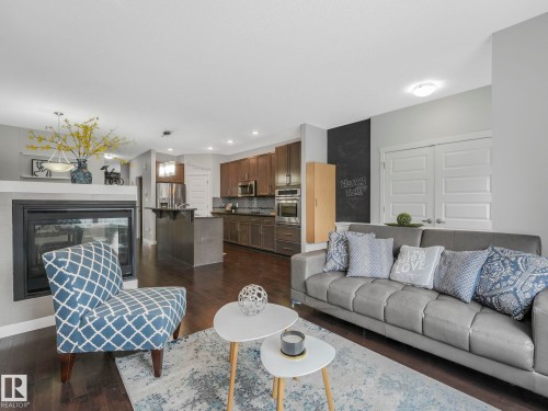 8318 79 Avenue, Edmonton, AB - Indoor Photo Showing Living Room With Fireplace