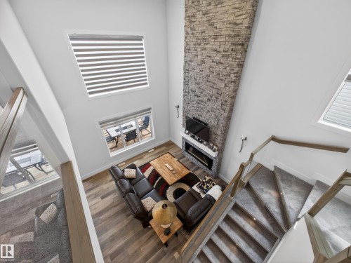75 Willow Link, Fort Saskatchewan, AB - Indoor Photo Showing Other Room With Fireplace