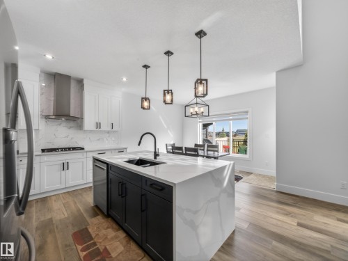 75 Willow Link, Fort Saskatchewan, AB - Indoor Photo Showing Kitchen With Double Sink With Upgraded Kitchen