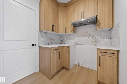 459 Crystal Creek Link, Leduc, AB - Indoor Photo Showing Laundry Room