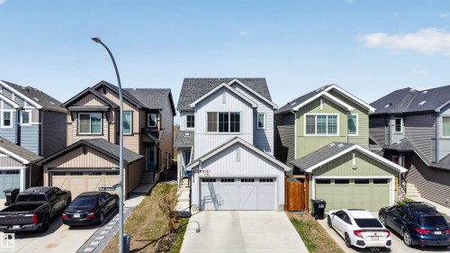 Contemporary two-story home featuring light gray siding and dark trim - 22638 99A Avenue, Edmonton, AB - Outdoor With Facade