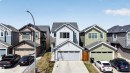 Contemporary two-story home featuring light gray siding and dark trim - 22638 99A Avenue, Edmonton, AB  - Outdoor With Facade 