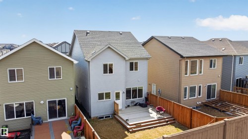 Two-story residence with light gray siding and a gray shingle roof - 22638 99A Avenue, Edmonton, AB - Outdoor With Exterior