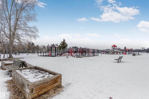 The surrounding area features a spacious park with a playground, mature trees, and benches - 24 Sable Crescent, St. Albert, AB - Outdoor With View