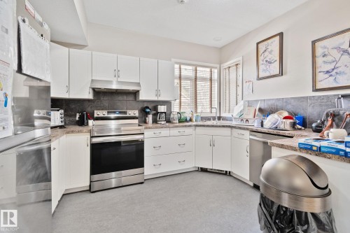 9512 154 Street, Edmonton, AB - Indoor Photo Showing Kitchen With Double Sink
