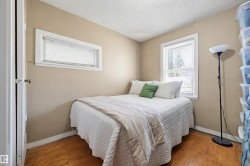 Hardwood-finish flooring complements neutral wall tones - 