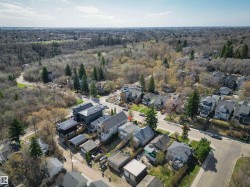 Residential neighborhood with a forested ravine backdrop - 