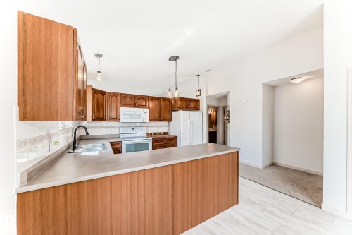Edmonton, AB - Indoor Photo Showing Kitchen