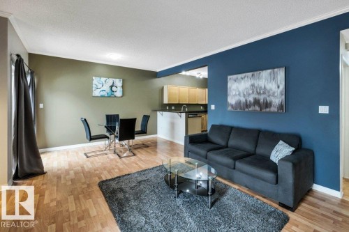 64 3040 Spence Wynd, Edmonton, AB - Indoor Photo Showing Living Room